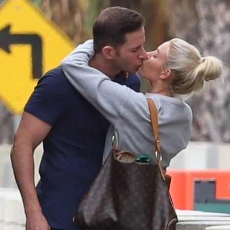 Heather and Tarek Kissing